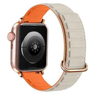 For Apple Watch 9 41mm Reverse Buckle Magnetic Silicone Watch Band(Rose Buckle Starlight Orange)