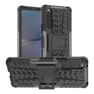 For Sony Xperia 10 V Tire Texture TPU + PC Phone Case with Holder(Black)