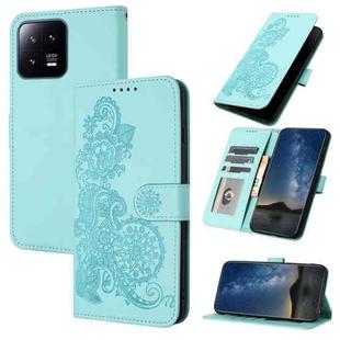 For Xiaomi 13 Datura Flower Embossed Flip Leather Phone Case(Light blue)