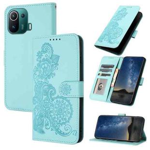 For Xiaomi Mi 11 Pro Datura Flower Embossed Flip Leather Phone Case(Light blue)