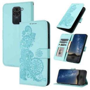 For Xiaomi Redmi NOTE 9 4G Global Datura Flower Embossed Flip Leather Phone Case(Light blue)