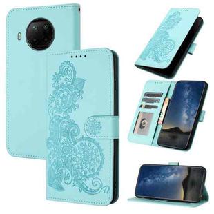 For Xiaomi Redmi Note 9 Pro Datura Flower Embossed Flip Leather Phone Case(Light blue)