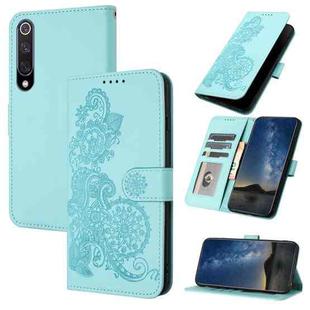 For Xiaomi Mi CC9e Datura Flower Embossed Flip Leather Phone Case(Light blue)