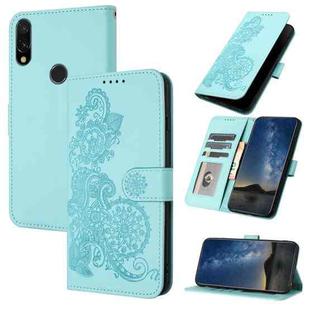 For Xiaomi Redmi 7 Datura Flower Embossed Flip Leather Phone Case(Light blue)