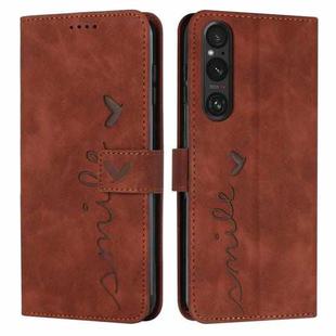 For Sony Xperia 1 V 2023 Skin Feel Heart Embossed Leather Phone Case with Long Lanyard(Brown)