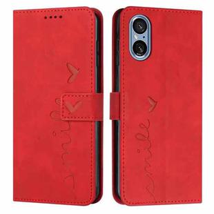 For Sony Xperia 5 V Skin Feel Heart Embossed Leather Phone Case with Long Lanyard(Red)