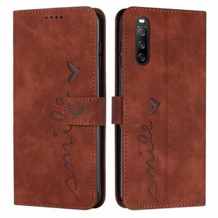 For Sony Xperia 10 V 2023 Skin Feel Heart Embossed Leather Phone Case with Long Lanyard(Brown)