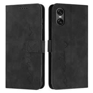 For Sony Xperia 5 VI Skin Feel Heart Embossed Leather Phone Case with Long Lanyard(Black)