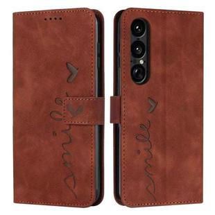 For Sony Xperia 1 VII Skin Feel Heart Embossed Leather Phone Case with Long Lanyard(Brown)