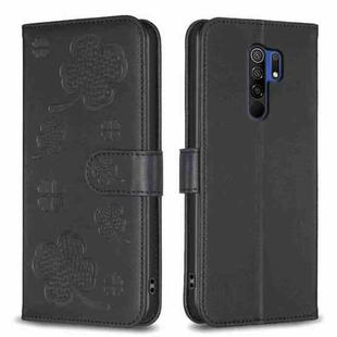 For Xiaomi Redmi 9 Four-leaf Embossed Leather Phone Case(Black)