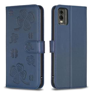For Nokia C32 Four-leaf Embossed Leather Phone Case(Blue)