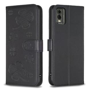 For Nokia C32 Four-leaf Embossed Leather Phone Case(Black)