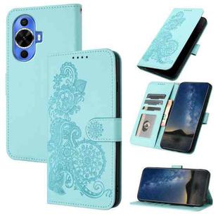 For Huawei nova 12s Datura Flower Embossed Flip Leather Phone Case(Light blue)
