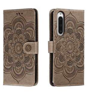 For Sony Xperia 10 V Sun Mandala Embossing Pattern Phone Leather Case(Grey)