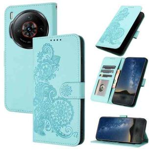 For ZTE nubia Z60S Pro Datura Flower Embossed Flip Leather Phone Case(Light Blue)