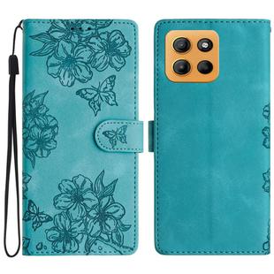 For Motorola Moto G15 Cherry Blossom Butterfly Skin Feel Embossed PU Phone Case(Green)
