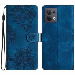 For OPPO Reno8 5G Global Cherry Blossom Butterfly Skin Feel Embossed PU Phone Case(Blue)