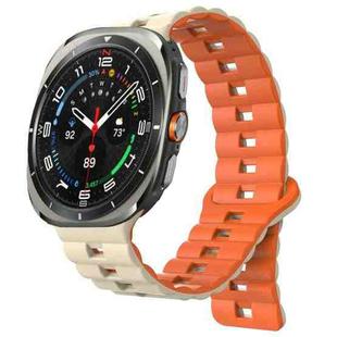 For Samsung Galaxy Watch Ultra 47mm Reverse Buckle Two Color Magnetic Silicone Watch Band(Starlight+Orange)