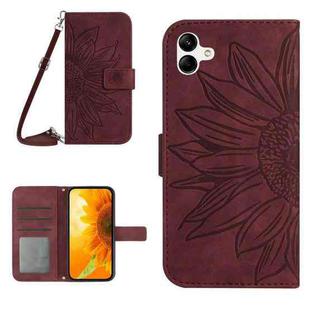 For Samsung Galaxy A07 5G Skin Feel Sun Flower Embossed Flip Leather Phone Case with Lanyard(Wine Red)
