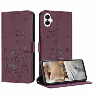 For Samsung Galaxy A07 4G Embossed Kitten Phone Leather Case with Lanyard(Wine Red)