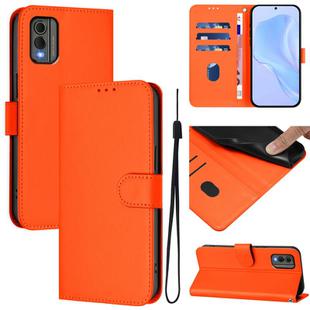 For Nokia C32 Skin Feel Solid Color Leather Phone Case with Lanyard(Orange)