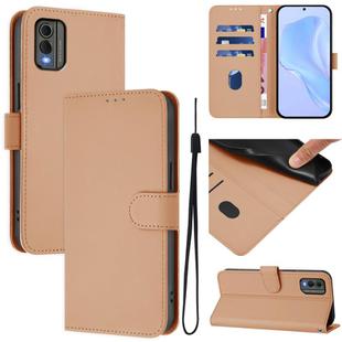 For Nokia C32 Skin Feel Solid Color Leather Phone Case with Lanyard(Nude)