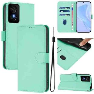 For TCL 50 SE Skin Feel Solid Color Leather Phone Case with Lanyard(Mint Green)