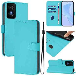 For TCL 50 SE Skin Feel Solid Color Leather Phone Case with Lanyard(Lake Blue)