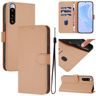For Sony Xperia 5 IV Skin Feel Solid Color Leather Phone Case with Lanyard(Nude)