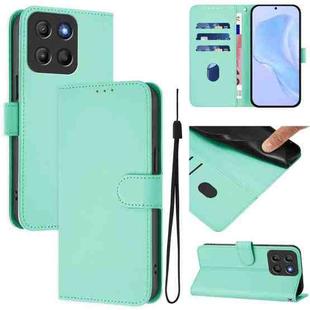 For Motorola Moto G15 Skin Feel Solid Color Leather Phone Case with Lanyard(Mint Green)