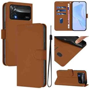 For Xiaomi Poco X4 Pro 5G Skin Feel Solid Color Leather Phone Case with Lanyard(Brown)