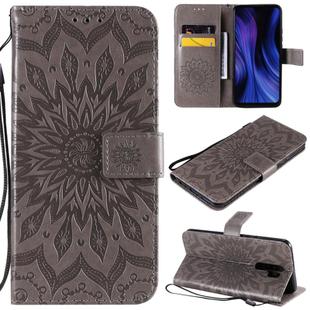 For Xiaomi Redmi 9 Sun Embossing Pattern Horizontal Flip Leather Case with Card Slot & Holder & Wallet & Lanyard(Grey)