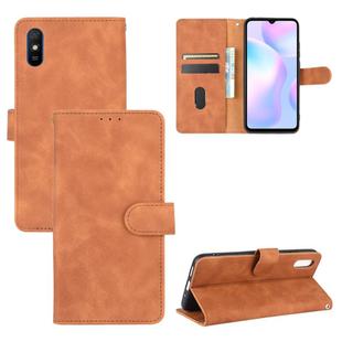 For Xiaomi Redmi 9A Solid Color Skin Feel Magnetic Buckle Horizontal Flip Calf Texture PU Leather Case with Holder & Card Slots & Wallet(Brown)