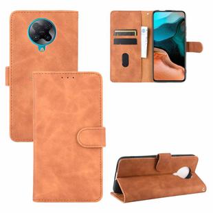 For Xiaomi Redmi K30 Pro Solid Color Skin Feel Magnetic Buckle Horizontal Flip Calf Texture PU Leather Case with Holder & Card Slots & Wallet(Brown)