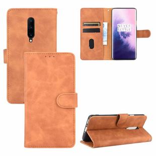 For OnePlus 7 Pro Solid Color Skin Feel Magnetic Buckle Horizontal Flip Calf Texture PU Leather Case with Holder & Card Slots & Wallet(Brown)