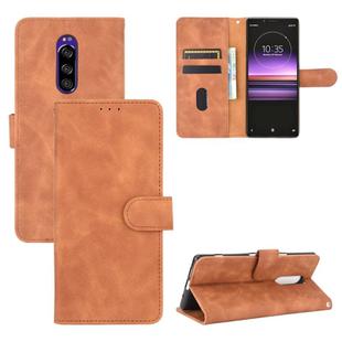 For Sony Xperia 1 Solid Color Skin Feel Magnetic Buckle Horizontal Flip Calf Texture PU Leather Case with Holder & Card Slots & Wallet(Brown)