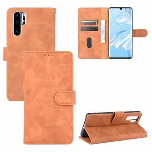 For Huawei P30 Pro Solid Color Skin Feel Magnetic Buckle Horizontal Flip Calf Texture PU Leather Case with Holder & Card Slots & Wallet(Brown)