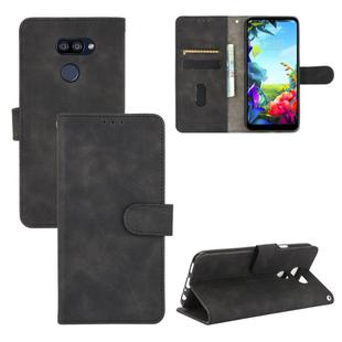 For LG K40S Solid Color Skin Feel Magnetic Buckle Horizontal Flip Calf Texture PU Leather Case with Holder & Card Slots & Wallet(Black)