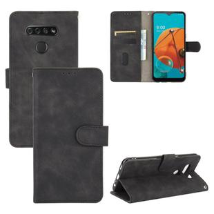 For LG K51 / Q51 Solid Color Skin Feel Magnetic Buckle Horizontal Flip Calf Texture PU Leather Case with Holder & Card Slots & Wallet(Black)