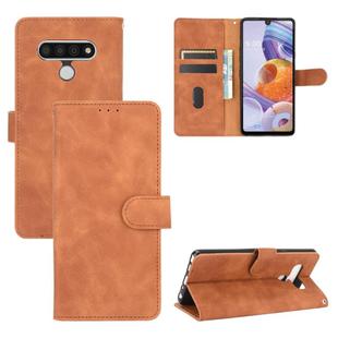 For LG Stylo 6 Solid Color Skin Feel Magnetic Buckle Horizontal Flip Calf Texture PU Leather Case with Holder & Card Slots & Wallet(Brown)