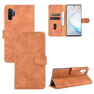 For Samsung Galaxy Note10 Plus Solid Color Skin Feel Magnetic Buckle Horizontal Flip Calf Texture PU Leather Case with Holder & Card Slots & Wallet(Brown)