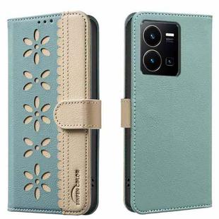 For vivo Y35 4G / Y22S Splicing Color Hollow Flower Pattern RFID Leather Phone Case(Green)