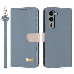 For Fujitsu Arrows We2 Plus F-51E Metal Bow Leather Phone Case with Hand Strap(Light Blue)