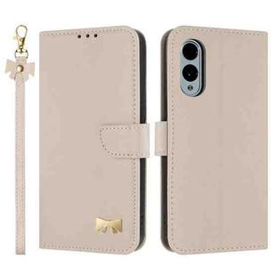 For Fujitsu Arrows We2 F-52E Metal Bow Leather Phone Case with Hand Strap(Apricot)