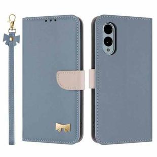 For Fujitsu Arrows We2 F-52E Metal Bow Leather Phone Case with Hand Strap(Light Blue)