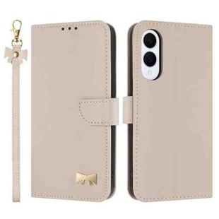 For Samsung Galaxy S25 Edge 5G Metal Bow Leather Phone Case with Hand Strap(Apricot)