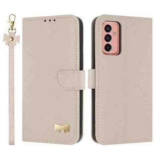 For Samsung Galaxy A13 4G / 5G Metal Bow Leather Phone Case with Hand Strap(Apricot)