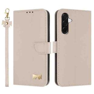 For Samsung Galaxy A26 5G Metal Bow Leather Phone Case with Hand Strap(Apricot)