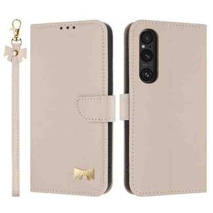 For Sony Xperia 1 V Metal Bow Leather Phone Case with Hand Strap(Apricot)