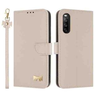 For Sony Xperia 10 V Metal Bow Leather Phone Case with Hand Strap(Apricot)